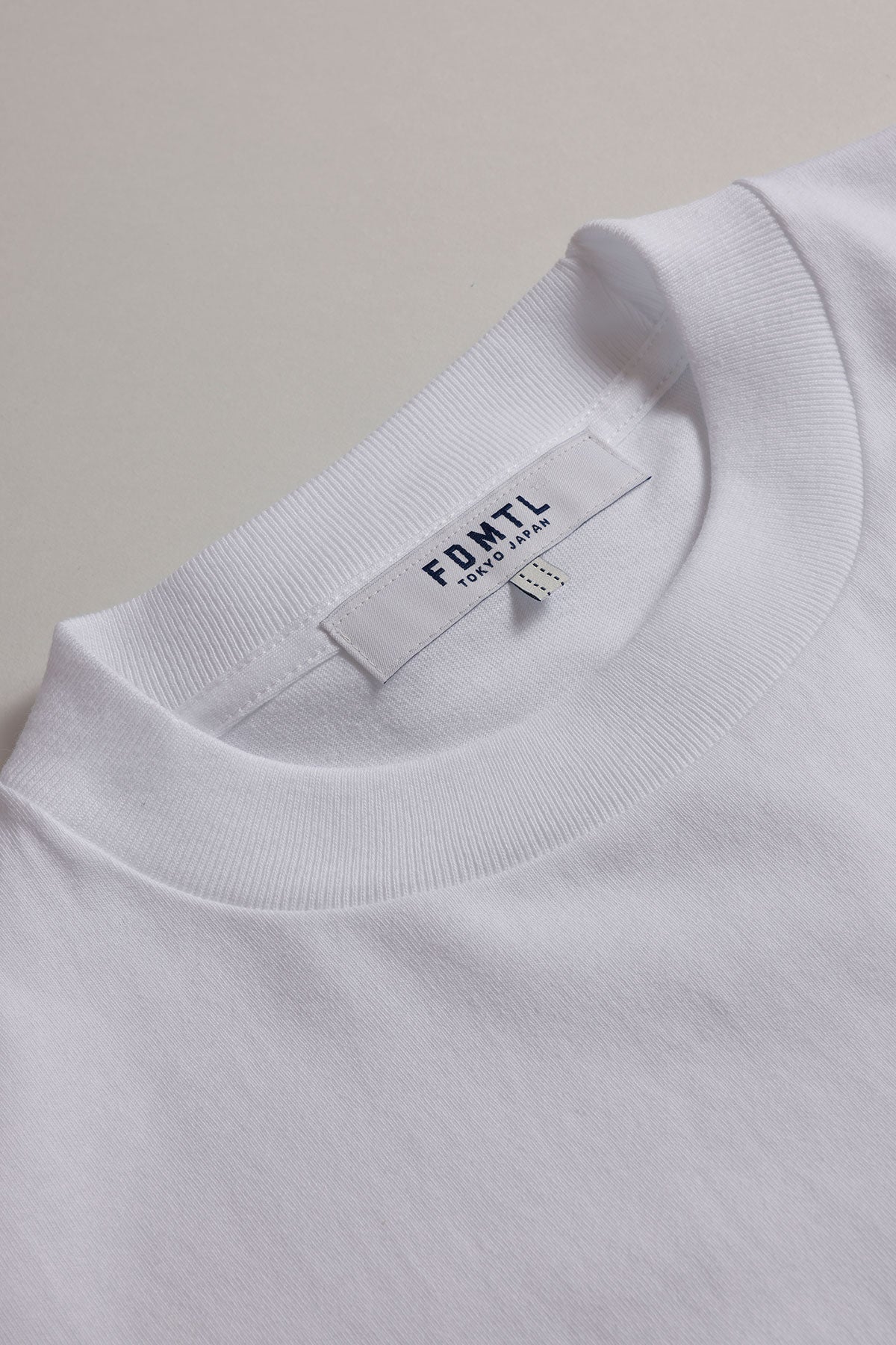 CIRCLE PATCH TEE