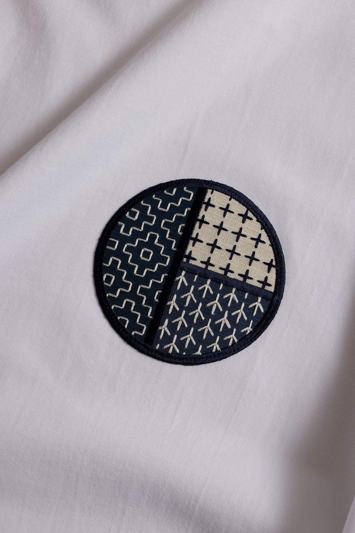 CIRCLE PATCH TEE
