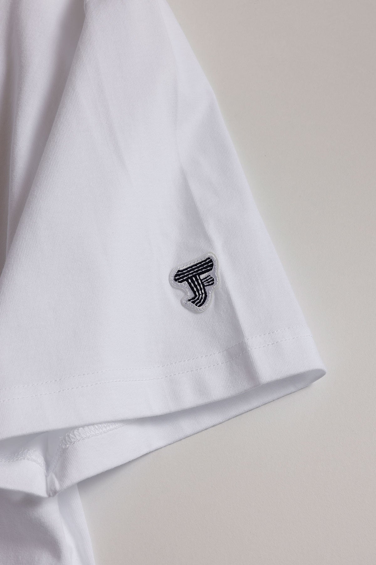 CIRCLE PATCH TEE