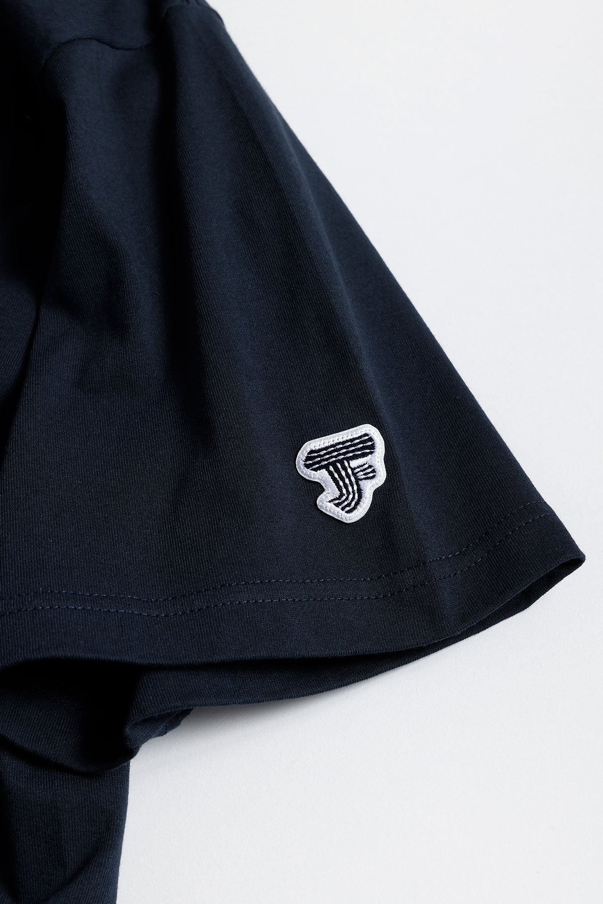 CIRCLE PATCH TEE