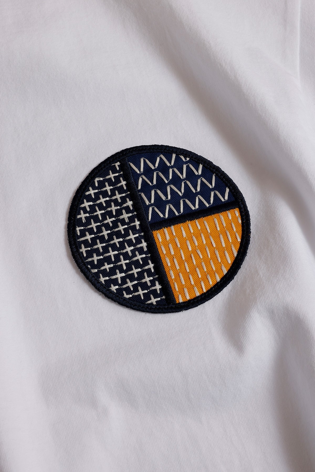 CIRCLE PATCH TEE