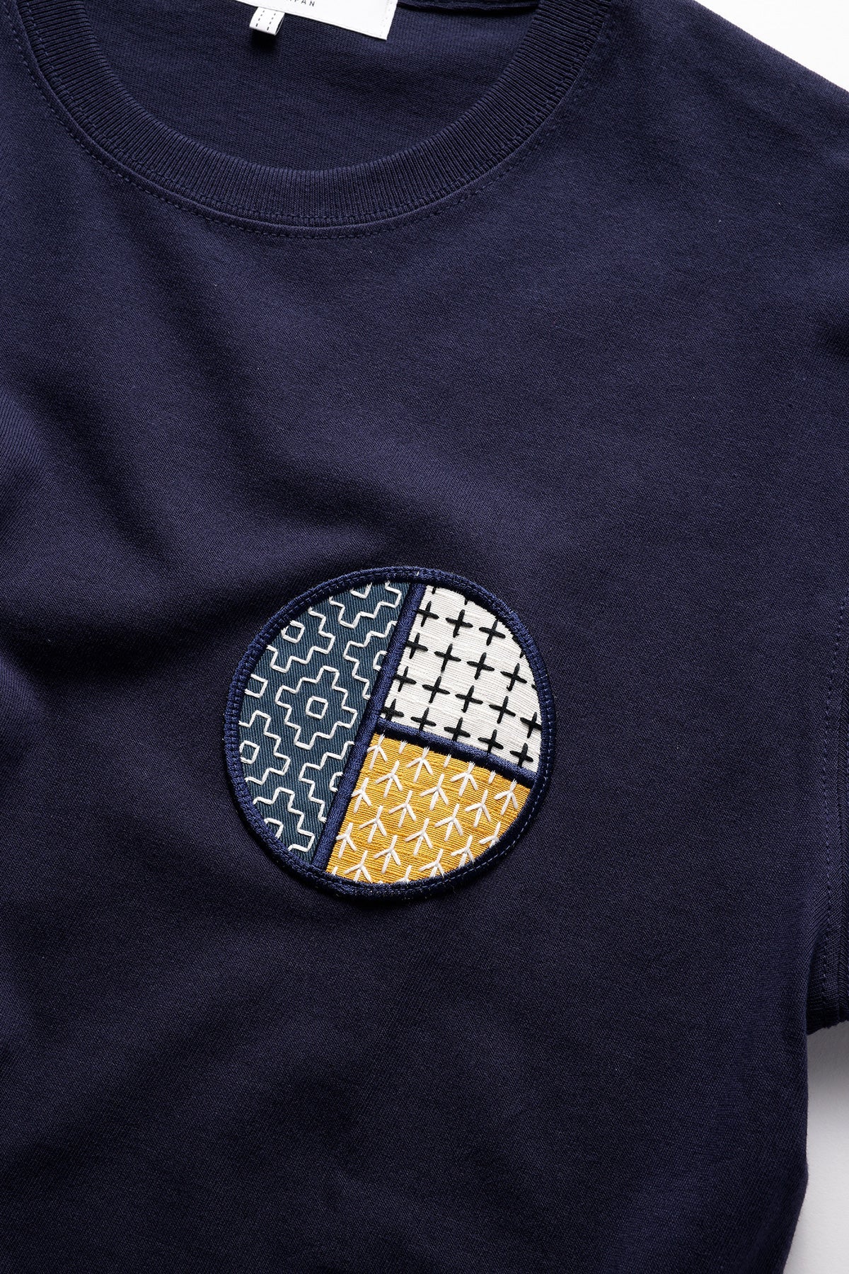 CIRCLE PATCH TEE